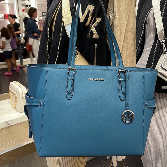 Michael Kors Gilly Large Drawstring Travel Leather Top Zip Tote
 Color: TEAL
NWT - Picture 16 of 16